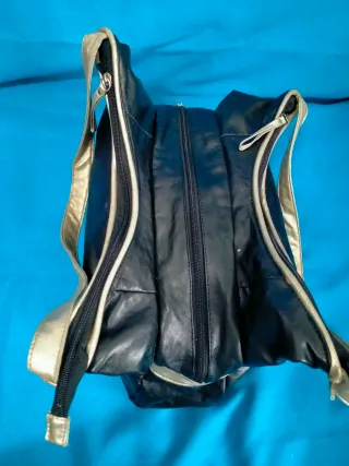 Bolso vintage negro y dorado