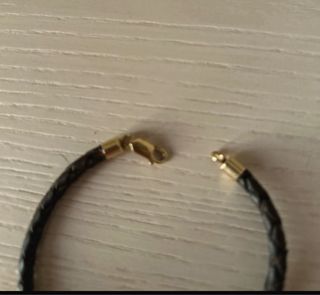 Braccialetto pelle e oro 18k