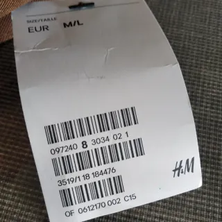 Cappello con visiera marrone e nero