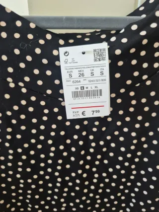 Top de lunares negro y blanco