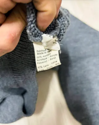 Maglione grigio collo alto