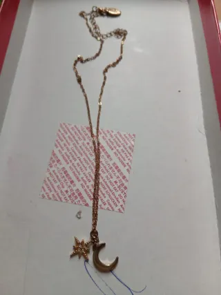 Collana con stella e luna dorata