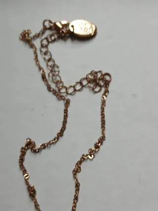 Collana con stella e luna dorata