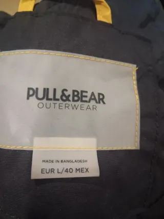 Chubasquero hombre negro y amarillo