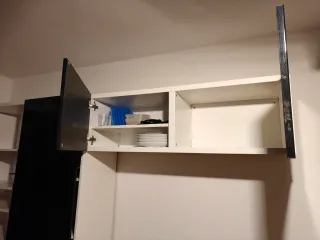 Mueble de cocina modular negro y blanco