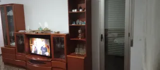 Mueble de salón madera y cristal