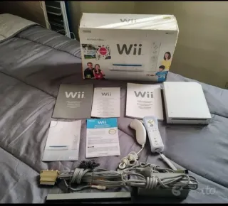 Nintendo Wii + Pedana Fit + Giochi
