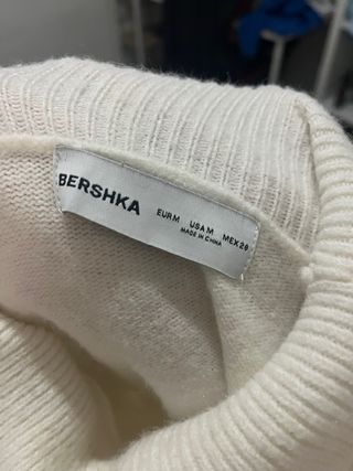 Blusa cropped gola alta manga longa