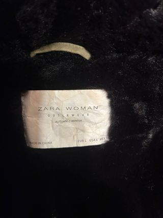 Abrigo verde con capucha de pelo