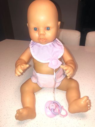 Muñeco bebé con accesorios