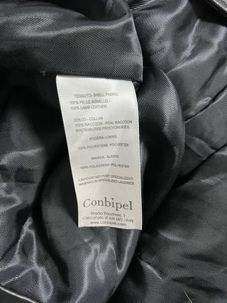 Abrigo de cuero negro con cuello de pelo T. L