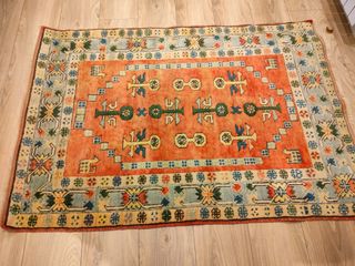 Alfombra de lana naranja y azul