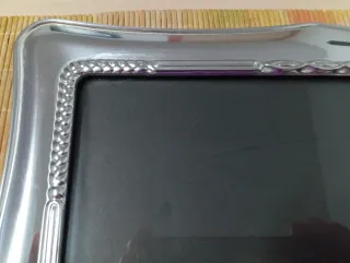 Marco de fotos plateado decorado