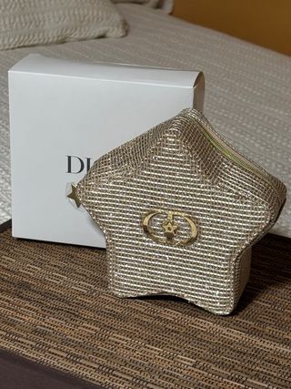 Bolsito fiesta Dior estrella dorado