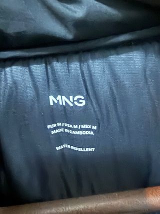 Chaquetón negro plumas Mango talla m y XXS