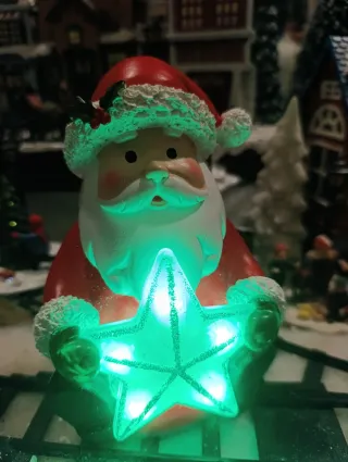 Papá Noel con estrella luminosa