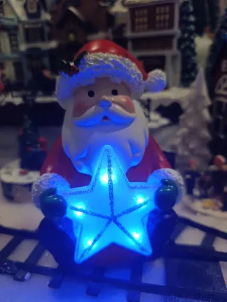 Papá Noel con estrella luminosa