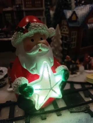 Papá Noel con estrella luminosa