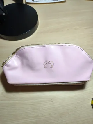 Joyero de viaje rosa y dorado