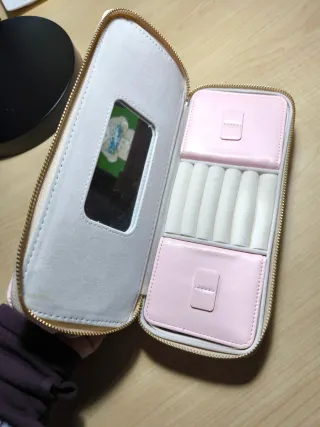 Joyero de viaje rosa y dorado