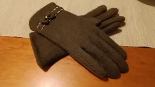 Par de guantes verdes