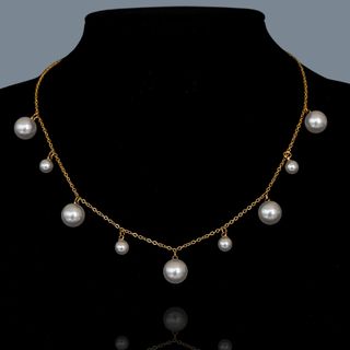 Collar de perlas oro y blanco