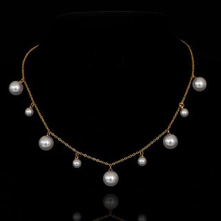 Collar de perlas oro y blanco