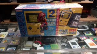 Nintendo Game Boy 2 juegos y funda carry case plus