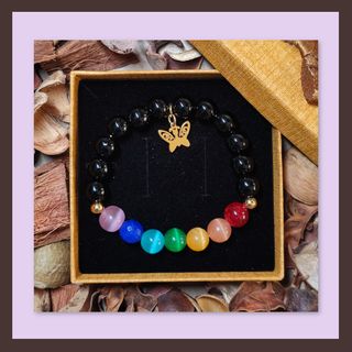 Pulsera 7 Chakras con dije mariposa dorada