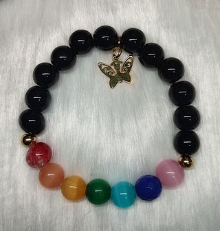 Pulsera 7 Chakras con dije mariposa dorada
