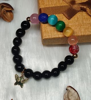 Pulsera 7 Chakras con dije mariposa dorada