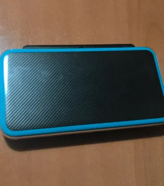 New Nintendo 2DS XL + Juegos + caja