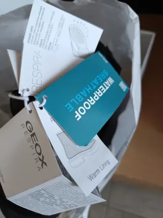 Scarpa/stivaletti neri e marroni