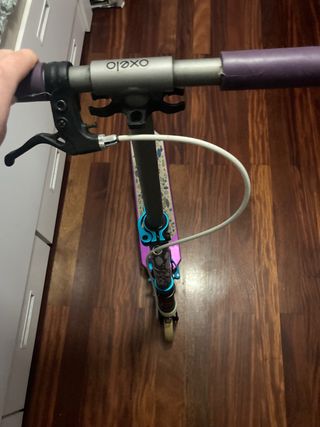 Patinete morado niña casi nuevo