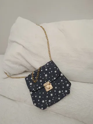 Bolso infantil estrellas cadena dorada