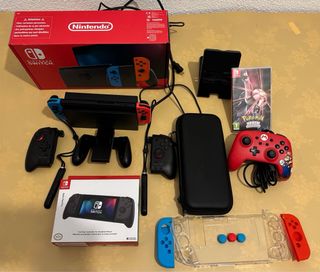 Nintendo Switch + controller Mario, accessori, microSD
