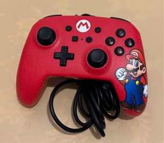 Nintendo Switch + controller Mario, accessori, microSD