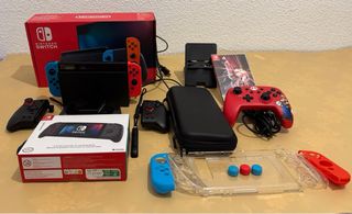 Nintendo Switch + controller Mario, accessori, microSD