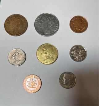 Lotto di 8 monete straniere da collezione