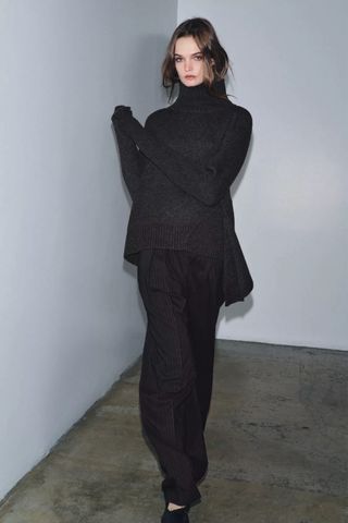 ZARA JERSEY CON LANA BAJO ASIMÉTRICO TALLA L