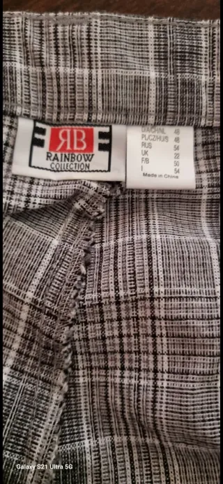 Pantaloni a quadri grigi e bianchi