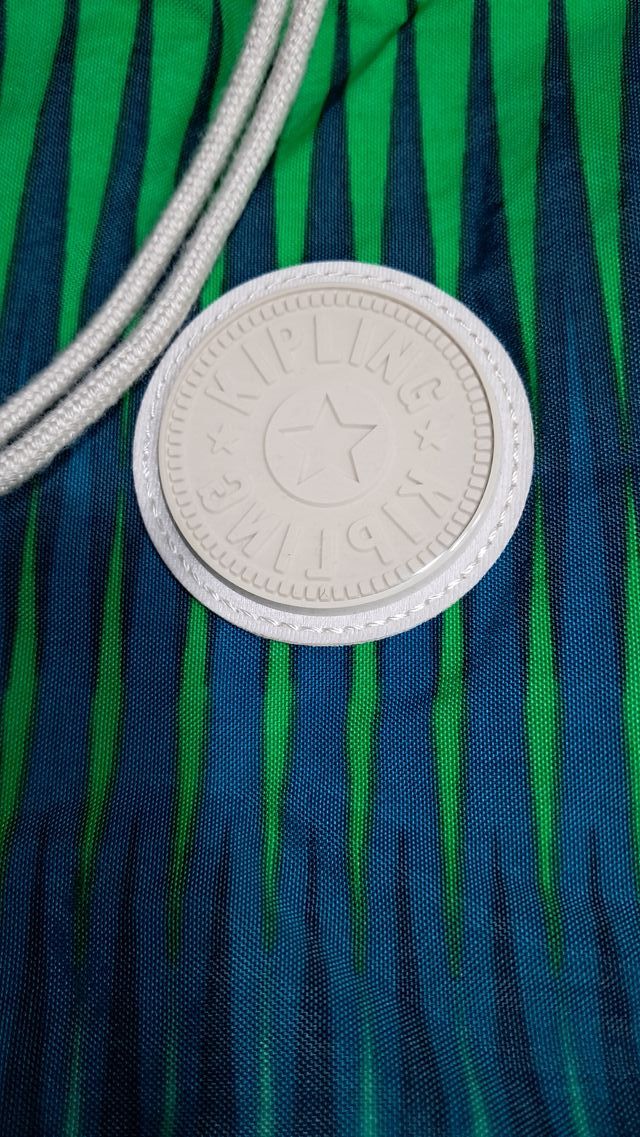 Mochila saco Kipling verde y azul