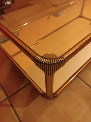 Mesa de centro cristal y metal dorado