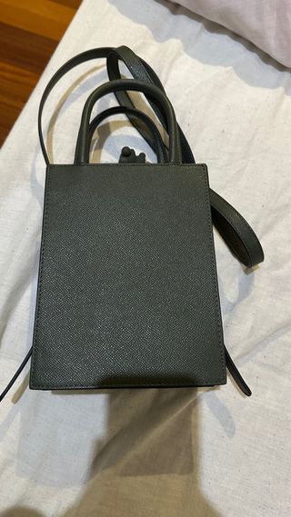 Bolso Tous verde oscuro con charm oso