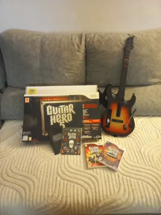 Guitarra Guitar Hero + 2 juegos Wii