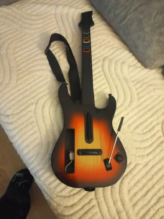 Guitarra Guitar Hero + 2 juegos Wii