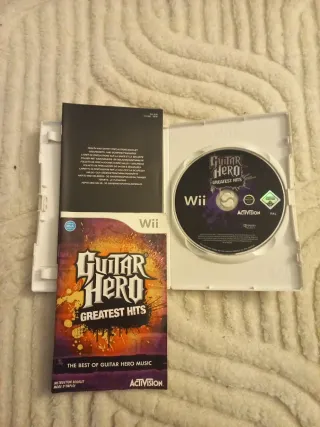 Guitarra Guitar Hero + 2 juegos Wii