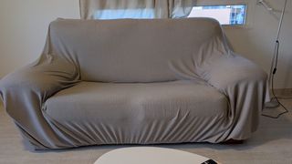 Funda para sofá de dos plazas de tela color gris