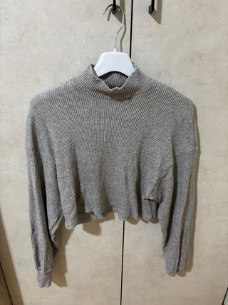 Jersey gris canalé cuello alto