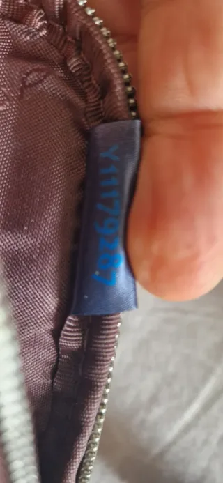 Borsa tracolla Piquadro marrone in pelle.